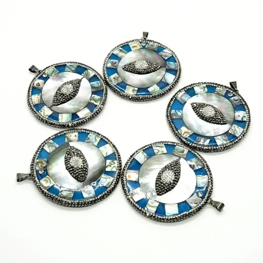 Pandantiv rotund sidef cu marcasite - cu ochi