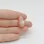 Cabochon Piatra lunii piersica 26x14x7mm C90