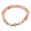 Bratara pe elastic Perle de cultura, bumbi aurii si Cuart piersica sfere 8mm