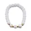 Bratara pe elastic Perle de cultura, bumbi aurii si Onix alb sfere mate 8mm